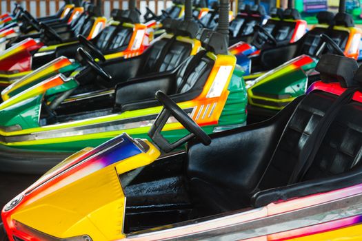 Electric cars in amusement park waiting for action!