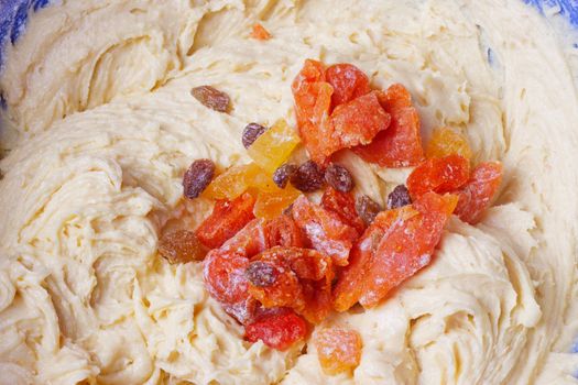 Dried cheese on the dough. Dried apricots, candied