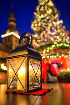  Lantern at european Christmas market in front of Christmas tree and Cathedral