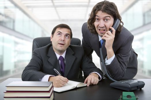 business team working at a desk, at the office