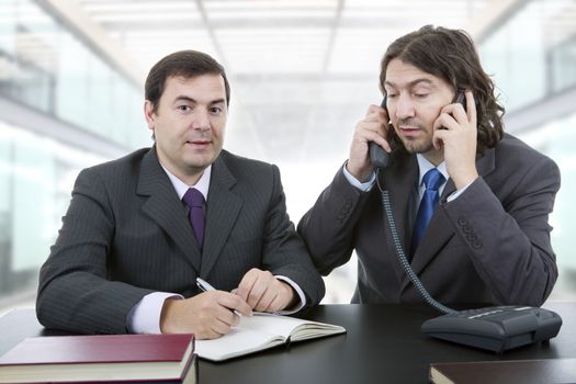 business team working at a desk at the office