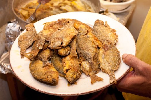 Small fishes of the Greek sea roasted in the frying pan