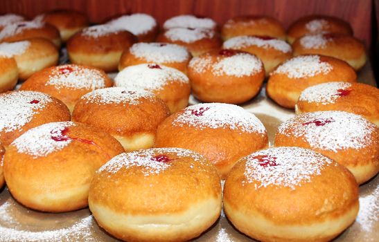 classic Hanukkah sufganiyot filled with strawberry jelly