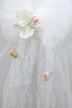 Wedding decoration with ribbons and dried flowers
