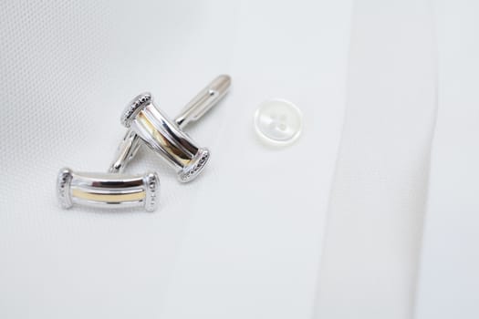 Groom accessories. Cufflinks on the shirt