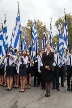 THESSALONIKI, GREECE - OCT 27:100th liberation anniversary from the City's 500 years Ottoman Empire Occupation; flown of the Greek flag on the White Tower on Oct 27, 2012 in Thessaloniki, Greece