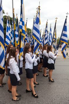 THESSALONIKI, GREECE - OCT 27:100th liberation anniversary from the City's 500 years Ottoman Empire Occupation; flown of the Greek flag on the White Tower on Oct 27, 2012 in Thessaloniki, Greece