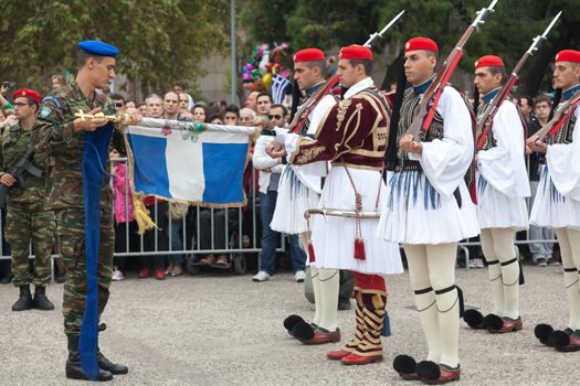 THESSALONIKI, GREECE - OCT 27:100th liberation anniversary from the City's 500 years Ottoman Empire Occupation; flown of the Greek flag on the White Tower on Oct 27, 2012 in Thessaloniki, Greece