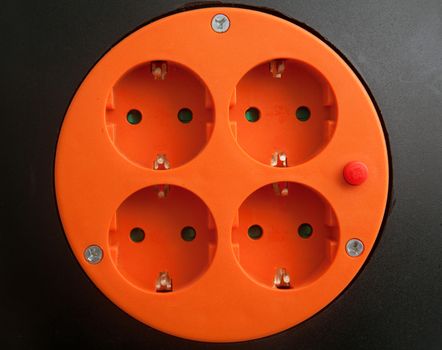 Socket extender in black and orange tones