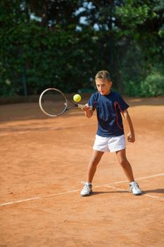 Children at school during a dribble of tennis