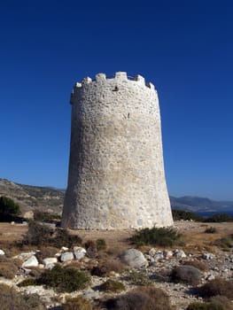 Old stone windmill on chios island in Greece
