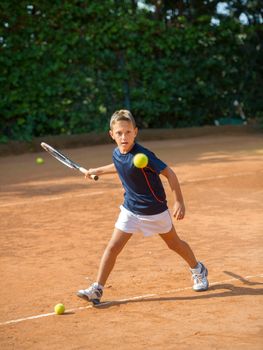 Children at school during a dribble of tennis