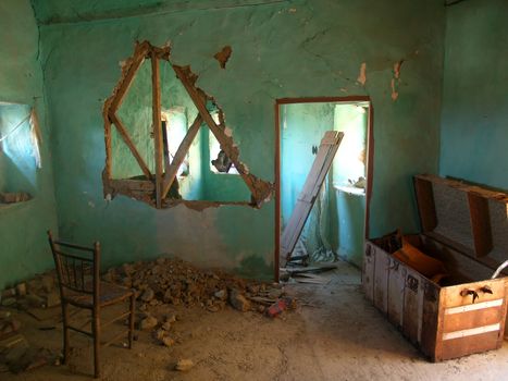 Ruined and destroyed house in the village Volissos of Chios Island in Greece