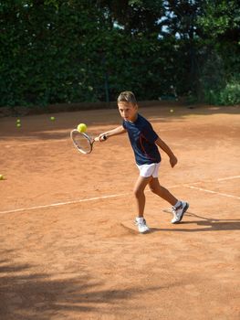 Children at school during a dribble of tennis