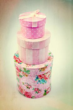 Vintage present gifts from floral pink paper in pastel tones