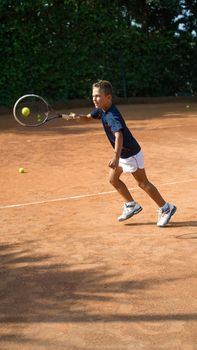 Children at school during a dribble of tennis