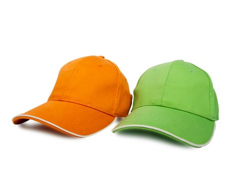 two baseball caps isolated on white background, studio shot