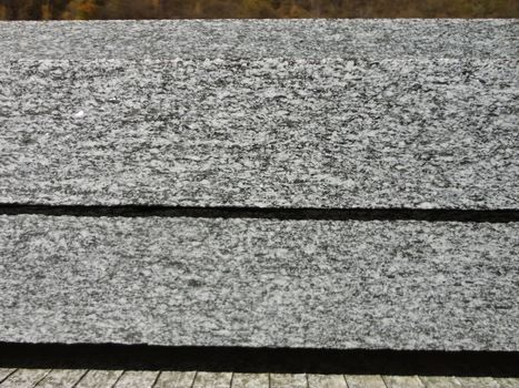 Manufactured Industrial Cutting of Granite. Surface View.
Background.