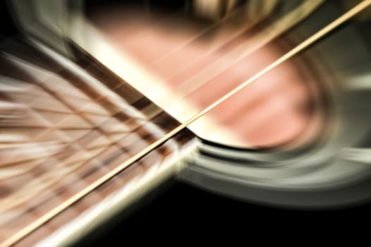 acoustic guitar motion blur of vibrating strings