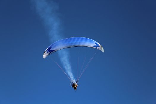 Some pilots, paragliders, make the spectacular perform