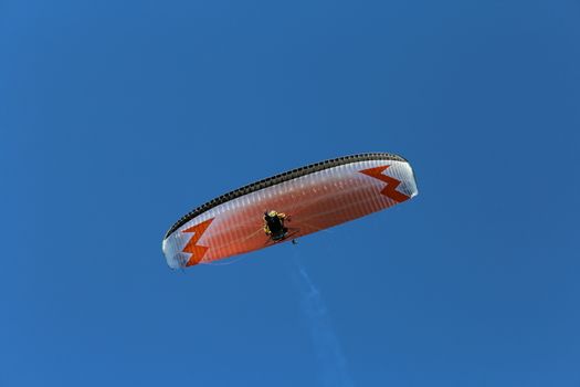 Some pilots, paragliders, make the spectacular perform