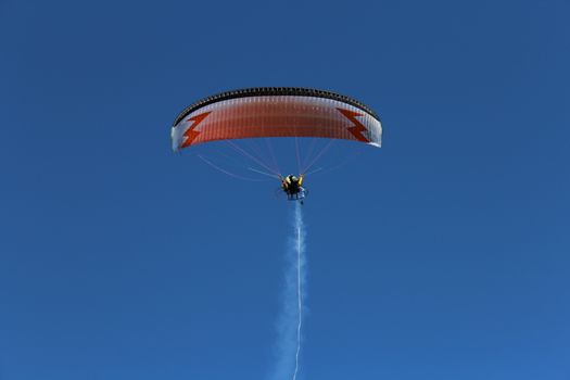 Some pilots, paragliders, make the spectacular perform