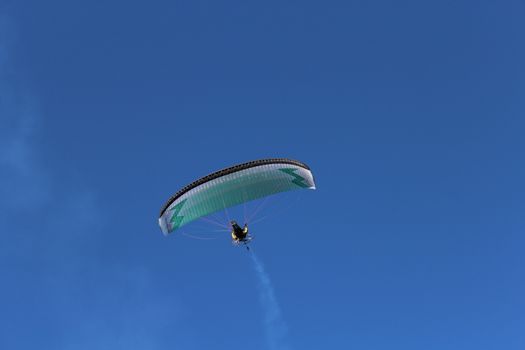 Some pilots, paragliders, make the spectacular perform