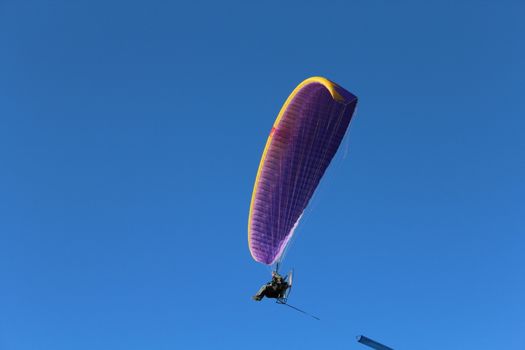 Some pilots, paragliders, make the spectacular perform