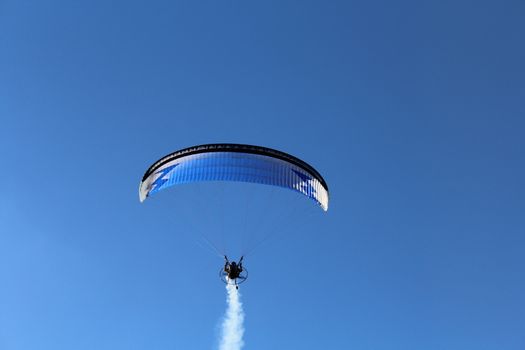 Some pilots, paragliders, make the spectacular perform