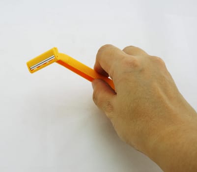 Women hold the blade for shaving on white background.                              