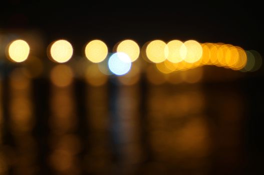 The light from the river bank glittering nightlife, scintillating variety of colors.                     