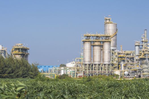 Silos in chemical factory with blue sky 