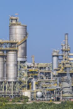 Silos in chemical factory with blue sky 