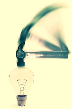 Hammer hitting a Light Bulb with motion blur