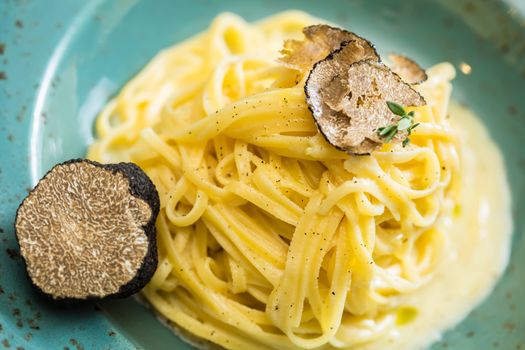 Dish of pasta with truffle. selective focus. close-up