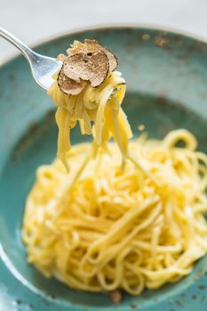 Dish of pasta with truffle. selective focus. close-up