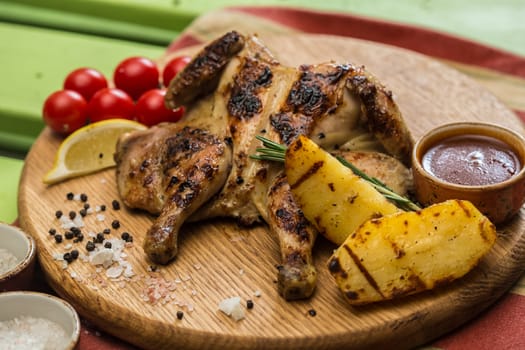 Grilled Chicken Plate in a restaurant. selective Focus