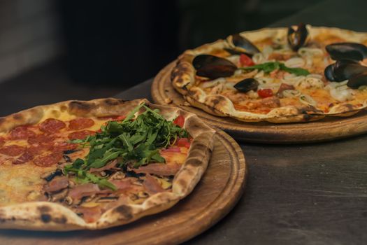 Delicious italian pizza served on table. selective focus