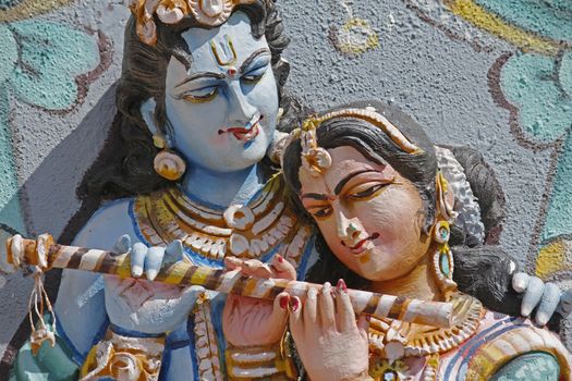 Sculpture of Radha Krishna at Shrinath Mhaskoba Temple, Kodit, Sasvad, Maharashtra, India. Radha Krishna are collectively known within Hinduism as the combination of both the feminine as well as the masculine aspects of God. Krishna is referred as svayam bhagavan in Gaudiya Vaishnavism theology and Radha is Krishna's supreme beloved.