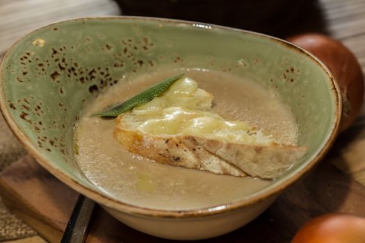 The french onion gratin soup. selective Focus