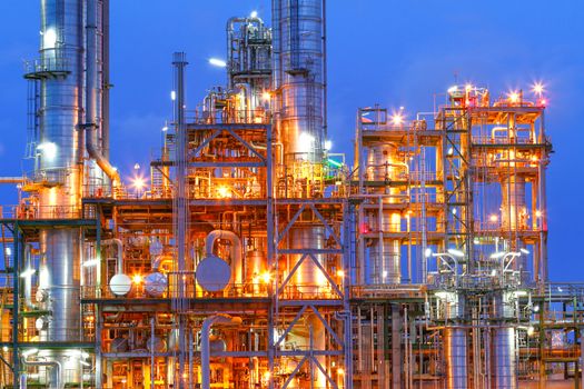 Lighting from structure of oil and chemical factory with blue sky background