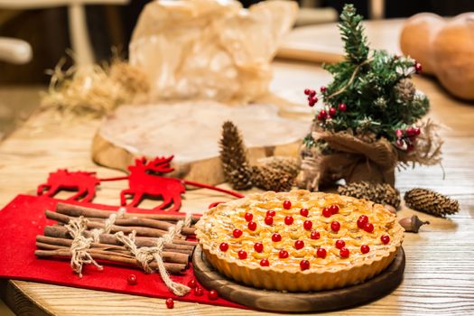 Homemade christmas cake with wild berries. Shallow dof.