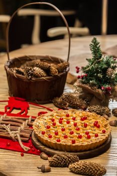 Homemade christmas cake with wild berries. Shallow dof.