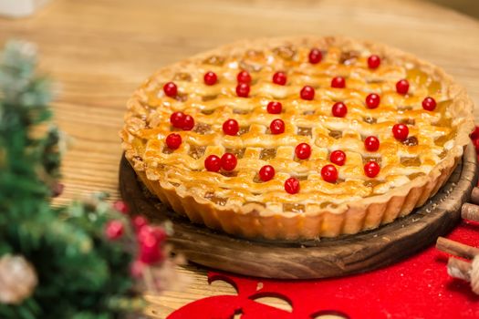 Homemade christmas cake with wild berries. Shallow dof.