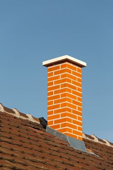 Chimney on a roof of a house