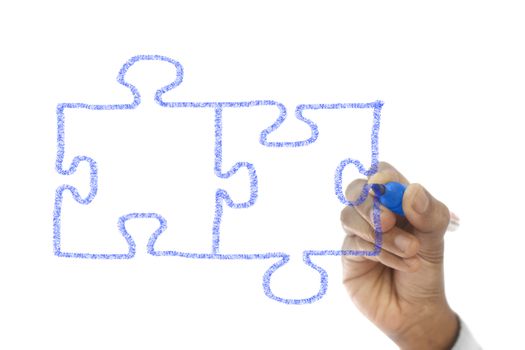 Jigsaw Pieces are drawn on transparent wipe board