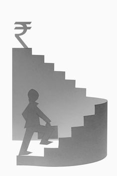Businessman stepping up a staircase