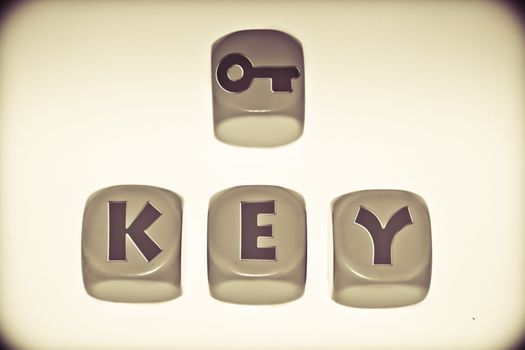 Key symbol with word KEY on cubes