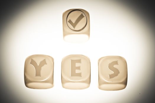 Yes symbol with word YES on cubes