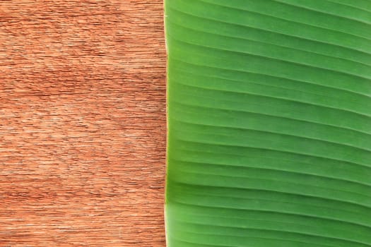 Banana leaf on the wooden board